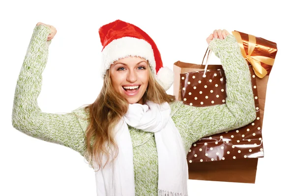 Sorridente ragazza a Babbo Natale cappello — Foto Stock