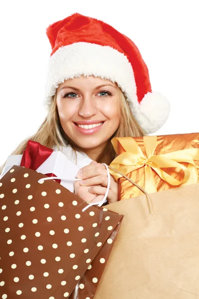 Sorridente ragazza a Babbo Natale cappello — Foto Stock