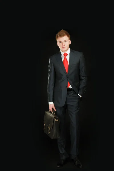 Portret człowieka sukcesu w biznesie z torba — Zdjęcie stockowe