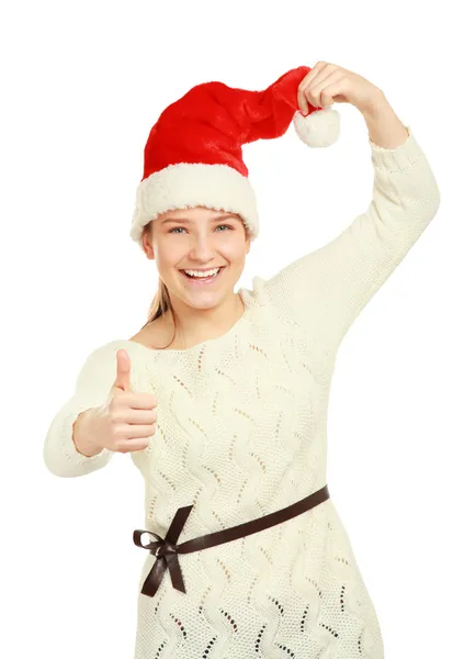 Cheerful young woman in santa hat showing ok sign — Stock Photo, Image