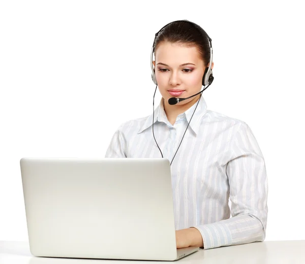 Una joven y sonriente chica de servicio al cliente con auriculares —  Fotos de Stock