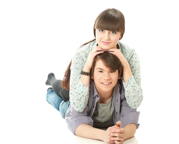 A young couple lying on the floor — Stock Photo, Image