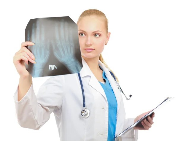 A female doctor examining an X-ray — Stock Photo, Image