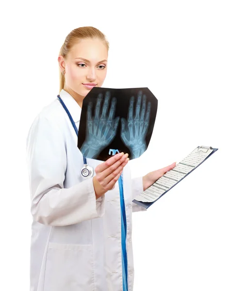 Female doctor examining an x-ray — Stock Photo, Image