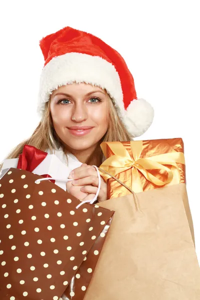 Smiling girl in santa hat Stock Picture