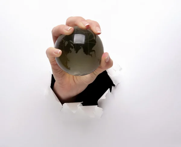 Female hands holding glass earth — Stock Photo, Image