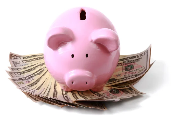 Piggy bank on dollars. — Stock Photo, Image