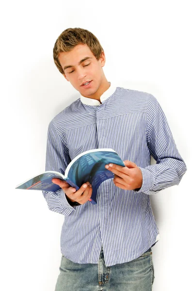 Un joven universitario con libros . — Foto de Stock