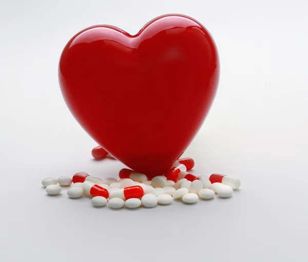 A heart with pills — Stock Photo, Image