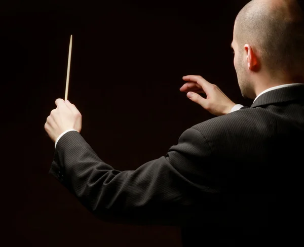 Conductor de concierto con bastón — Foto de Stock