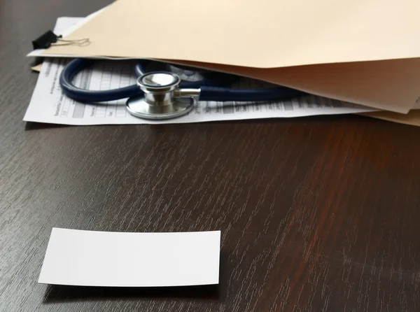 Stethoscope and patient's medical information. — Stock Photo, Image