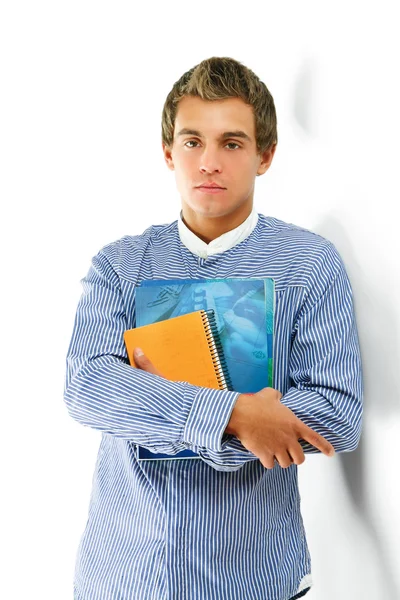 En unga college kille med böcker — Stockfoto