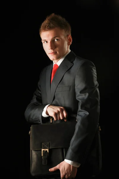 Successful business man with bag — Stock Photo, Image