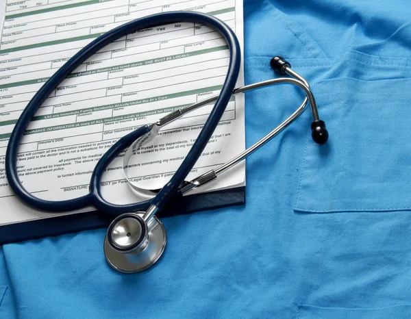 Doctor coat with stethoscope — Stock Photo, Image