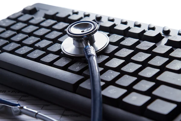 A stethoscope on   computer — Stock Photo, Image