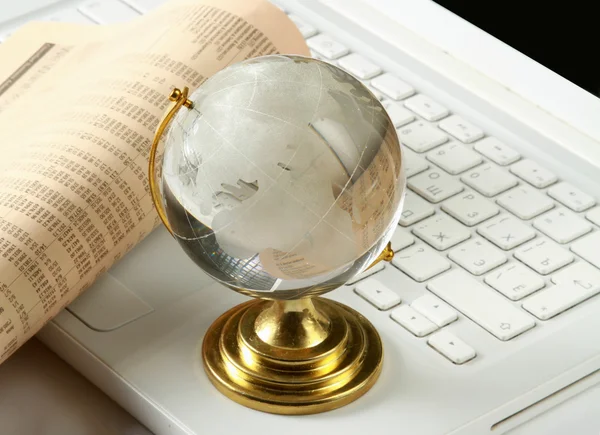 Background with laptop and globe — Stock Photo, Image