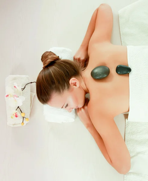 Woman  during  stone therapy — Stock Photo, Image