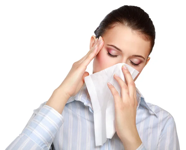 Sick woman blowing her nose Stock Image