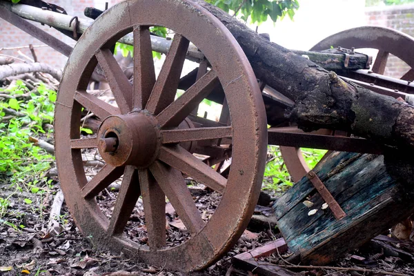 Old bullock cart and iron wheels in it, beauty of ancient