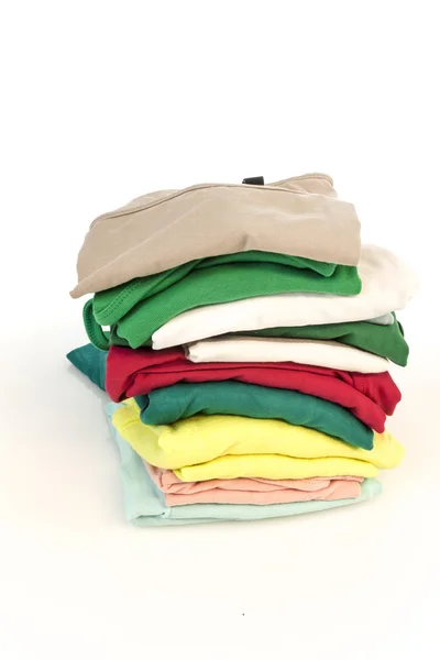 Pile of shirts isolated high angle — Stock Photo, Image