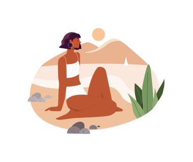 Kadın gün batımına bakıyor