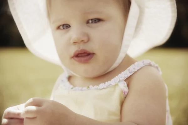 Little girl wearing hat — Stock Photo, Image