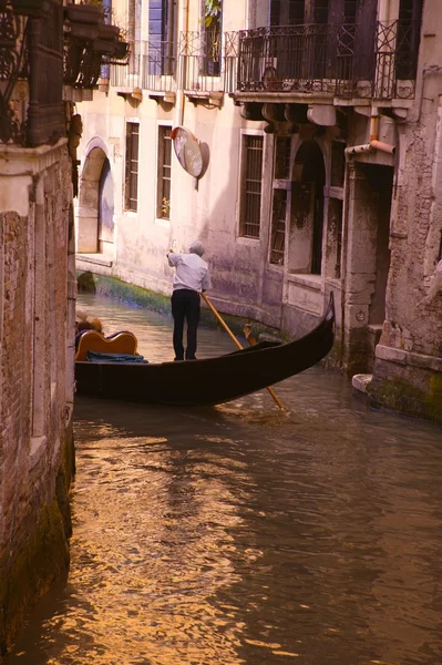 Gondolier riding gondola — Stock Photo, Image