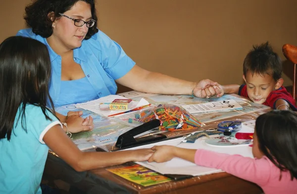 Woman Praying With Her Children — Stock Photo, Image