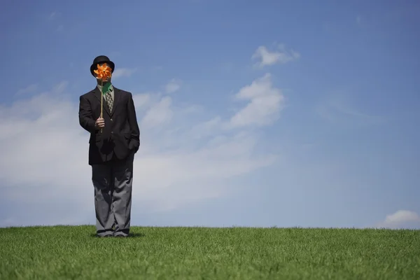 Businessman With A Windmill — Stock Photo, Image