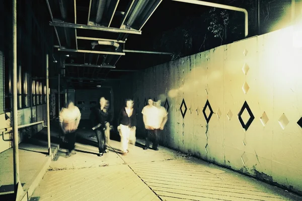 A Group Walks Underground — Stock Photo, Image