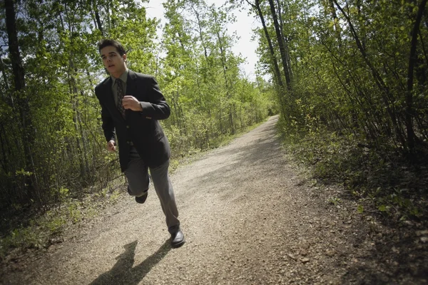 Joggen in een pak — Stockfoto