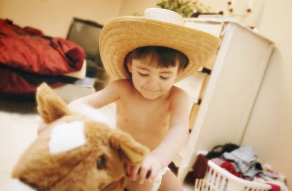 Child On Pretend Horse — Stock Photo, Image