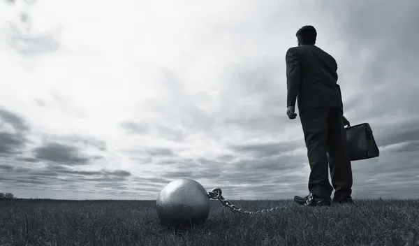 işadamı ile top ve zincir