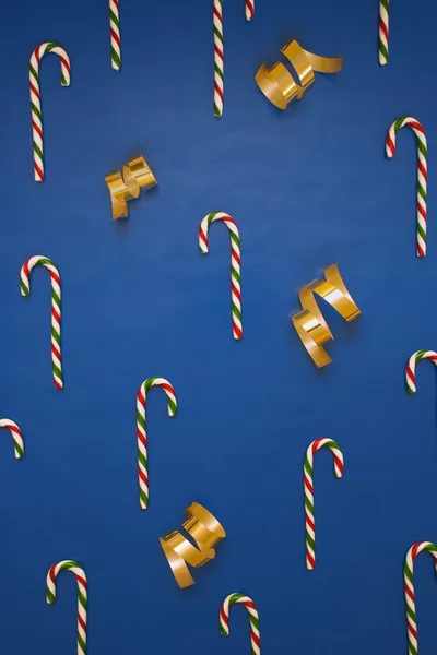 Cañas de caramelo y envoltura de regalo — Foto de Stock