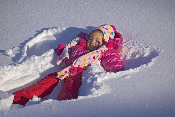 Girl Making A Snow Angel