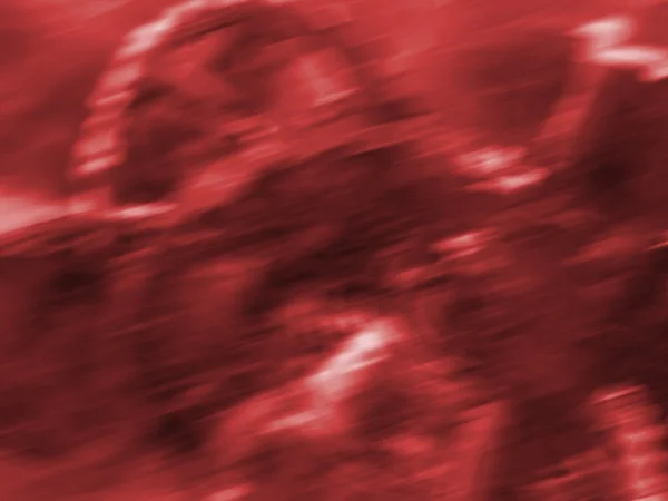 En suddig röda textur — Stockfoto