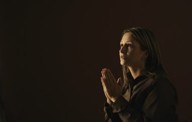A Woman In Prayer clipart