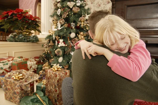 Christmas Morning Hug — Stock Photo, Image