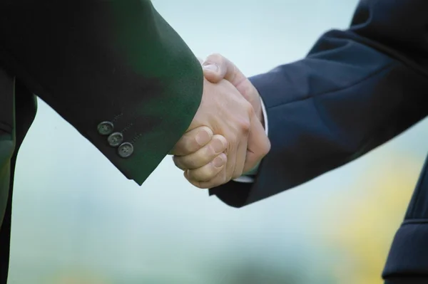 Businessmen handshake — Stock fotografie