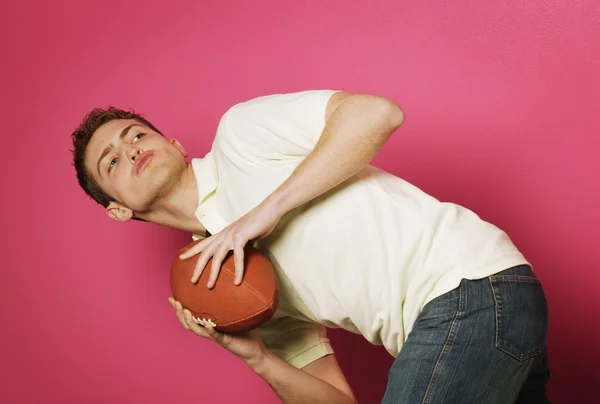 Teen holding futbol — Stok fotoğraf