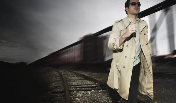 Man Runs Alongside A Train — Stock Photo, Image