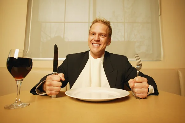 Homem à espera de comida — Fotografia de Stock