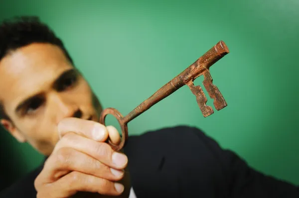 Businessman With Key — Stock Photo, Image