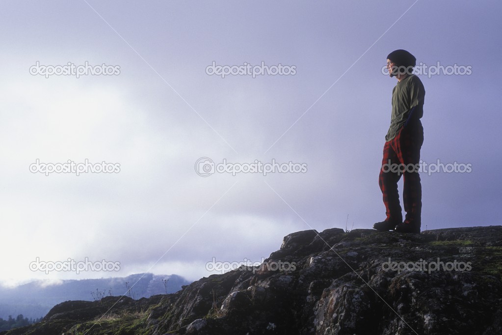 Hiker Looking Out At The Horizon