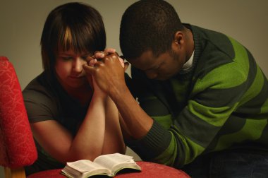 A Couple Praying Together clipart