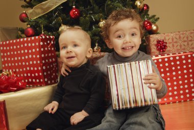 Children Under Christmas Tree clipart