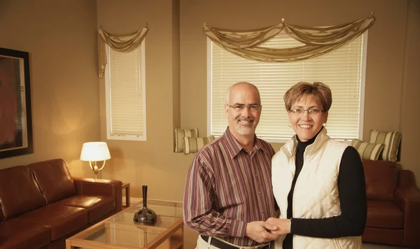 Mature Couple In A Contemporary Living Room — Stock Photo, Image