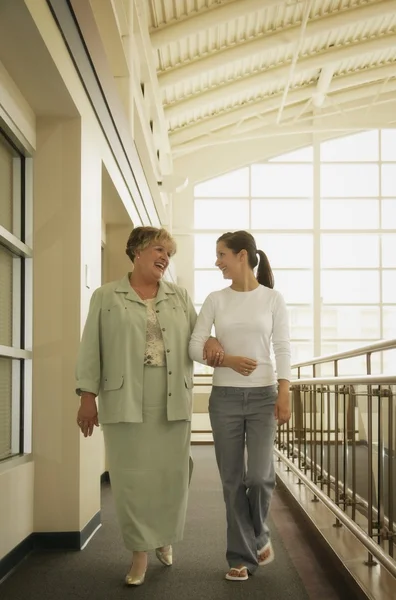 Mother And Daughter Inside A Public Building — Stock Photo, Image
