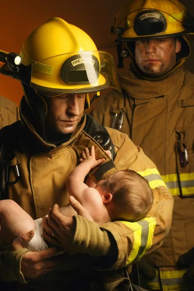 Rescuing Baby From Fire — Stock Photo, Image