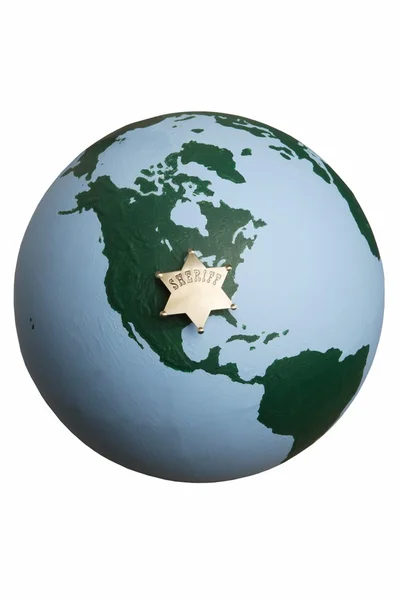 Şerif rozeti dünya küre üzerinde — Stok fotoğraf